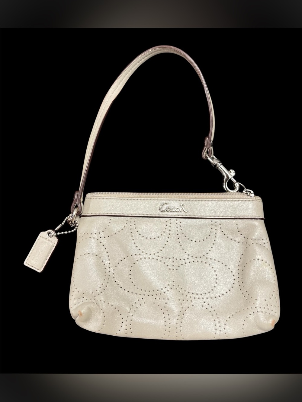 Coach perforated leather wristlet